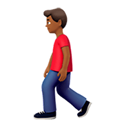 🚶🏾‍♂️ Emoji Hombre Caminando: Tono De Piel Oscuro Medio en Apple iOS 11.2.