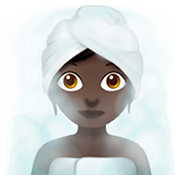🧖🏿‍♀️ Emoji Mujer En Una Sauna: Tono De Piel Oscuro en Apple iOS 11.2.