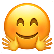 🤗 Emoji Cara Con Manos Abrazando en Apple iOS 12.1.