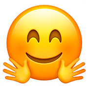 🤗 Emoji Cara Con Manos Abrazando en Apple iOS 13.2.