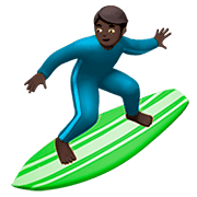🏄🏿‍♂️ Emoji Hombre Haciendo Surf: Tono De Piel Oscuro en Apple iOS 13.2.