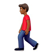 🚶🏾‍♂️ Emoji Hombre Caminando: Tono De Piel Oscuro Medio en Apple iOS 13.2.