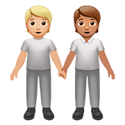 🧑🏼‍🤝‍🧑🏽 Emoji Dos Personas Dándose La Mano: Tono De Piel Claro Medio, Tono De Piel Medio en Apple iOS 13.2.