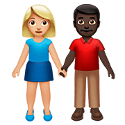 👩🏼‍🤝‍👨🏿 Emoji Mujer Y Hombre De La Mano: Tono De Piel Claro Medio Y Tono De Piel Oscuro en Apple iOS 13.2.