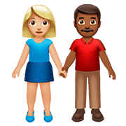 Émoji 👩🏼‍🤝‍👨🏾 Femme Et Homme Se Tenant La Main : Peau Moyennement Claire Et Peau Mate sur Apple iOS 13.2.