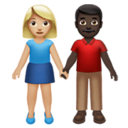 👩🏼‍🤝‍👨🏿 Emoji Mujer Y Hombre De La Mano: Tono De Piel Claro Medio Y Tono De Piel Oscuro en Apple iOS 13.3.