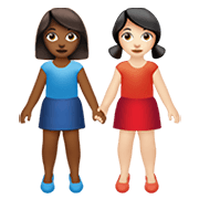👩🏾‍🤝‍👩🏻 Emoji Mujeres De La Mano: Tono De Piel Oscuro Medio Y Tono De Piel Claro en Apple iOS 13.3.