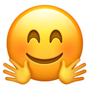 🤗 Emoji Gesicht mit umarmenden Händen Apple iOS 14.2.