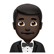 Emoji 🤵🏿‍♂️ Uomo in smoking: tonalità nera della pelle su Apple iOS 14.2.