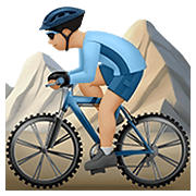 🚵🏼‍♂️ Emoji Homem Fazendo Mountain Bike: Pele Morena Clara na Apple iOS 14.2.