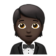 🤵🏿 Emoji Persona Con Esmoquin: Tono De Piel Oscuro en Apple iOS 14.2.