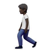 🚶🏿 Emoji Persona Caminando: Tono De Piel Oscuro en Apple iOS 14.2.