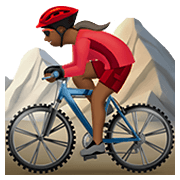 🚵🏾‍♀️ Emoji Mulher Fazendo Mountain Bike: Pele Morena Escura na Apple iOS 14.2.