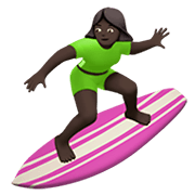 🏄🏿‍♀️ Emoji Mujer Haciendo Surf: Tono De Piel Oscuro en Apple iOS 14.2.
