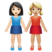👩🏻‍🤝‍👩🏼 Emoji Duas Mulheres De Mãos Dadas: Pele Clara E Pele Morena Clara na Apple iOS 14.5.