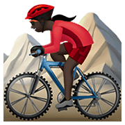 🚵🏿‍♀️ Emoji Mountainbikerin: dunkle Hautfarbe Apple iOS 15.4.
