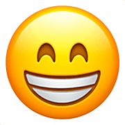 Emoji 😁 Faccina Raggiante Con Occhi Felici su Apple iOS 16.4.