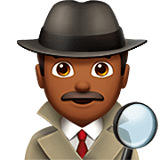 🕵🏾‍♂️ Emoji Detective Hombre: Tono De Piel Oscuro Medio en Apple iOS 16.4.