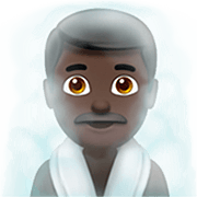 🧖🏿‍♂️ Emoji Mann in Dampfsauna: dunkle Hautfarbe Apple iOS 16.4.