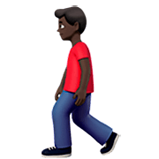 Emoji 🚶🏿‍♂️ Uomo Che Cammina: Carnagione Scura su Apple iOS 16.4.