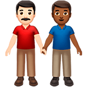 Emoji 👨🏻‍🤝‍👨🏾 Due Uomini Che Si Tengono Per Mano: Carnagione Chiara E Carnagione Abbastanza Scura su Apple iOS 16.4.
