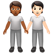 🧑🏾‍🤝‍🧑🏻 Emoji Dos Personas Dándose La Mano: Tono De Piel Oscuro Medio Y Tono De Piel Claro en Apple iOS 16.4.