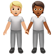 🧑🏼‍🤝‍🧑🏾 Emoji sich an den Händen haltende Personen: mittelhelle Hautfarbe, mitteldunkle Hautfarbe Apple iOS 16.4.