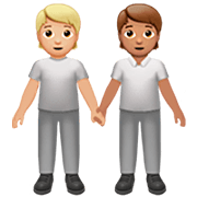 Émoji 🧑🏼‍🤝‍🧑🏽 Deux Personnes Se Tenant La Main : Peau Moyennement Claire Et Peau Légèrement Mate sur Apple iOS 16.4.