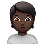 🙍🏿 Emoji missmutige Person: dunkle Hautfarbe Apple iOS 16.4.