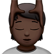 💆🏿 Emoji Persona Recibiendo Masaje: Tono De Piel Oscuro en Apple iOS 16.4.