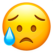 Emoji 😥 Faccina Delusa Ma Sollevata su Apple iOS 16.4.
