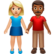 👩🏼‍🤝‍👨🏾 Emoji Mann und Frau halten Hände: mittelhelle Hautfarbe, mitteldunkle Hautfarbe Apple iOS 16.4.