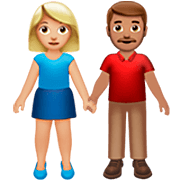Émoji 👩🏼‍🤝‍👨🏽 Femme Et Homme Se Tenant La Main : Peau Moyennement Claire Et Peau Légèrement Mate sur Apple iOS 16.4.
