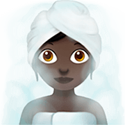 🧖🏿‍♀️ Emoji Frau in Dampfsauna: dunkle Hautfarbe Apple iOS 16.4.
