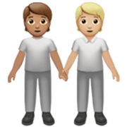 🧑🏽‍🤝‍🧑🏼 Emoji Dos Personas Dándose La Mano: Tono De Piel Medio Y Tono De Piel Claro Medio en Apple iOS 17.4.