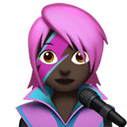 👩🏿‍🎤 Emoji Sängerin: dunkle Hautfarbe Apple iOS 17.4.