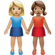 👩🏼‍🤝‍👩🏽 Emoji Duas Mulheres De Mãos Dadas: Pele Morena Clara E Pele Morena na Apple iOS 17.4.