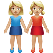 👭🏼 Emoji Mujeres De La Mano: Tono De Piel Claro Medio en Apple iOS 17.4.