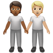🧑🏾‍🤝‍🧑🏼 Emoji Dos Personas Dándose La Mano: Tono De Piel Oscuro Medio Y Tono De Piel Claro Medio en Apple iOS 17.4.