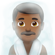 🧖🏾‍♂️ Emoji Homem Na Sauna: Pele Morena Escura na Apple iOS 17.4.
