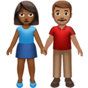 Émoji 👩🏾‍🤝‍👨🏽 Femme Et Homme Se Tenant La Main : Peau Mate Et Peau Légèrement Mate sur Apple iOS 17.4.