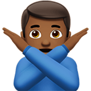 🙅🏾‍♂️ Emoji Hombre Haciendo El Gesto De «no»: Tono De Piel Oscuro Medio en Apple iOS 17.4.