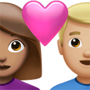 Émoji 👩🏽‍❤️‍👨🏼 Couple Avec Cœur - Femme: Peau Légèrement Mate, Homme: Peau Moyennement Claire sur Apple iOS 17.4.