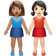 Émoji 👩🏽‍🤝‍👩🏻 Deux Femmes Se Tenant La Main : Peau Légèrement Mate Et Peau Claire sur Apple iOS 17.4.