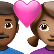 Emoji 👨🏾‍❤️‍👩🏽 Coppia Con Cuore - Uomo: Carnagione Abbastanza Scura, Donna: Carnagione Olivastra su Apple iOS 17.4.