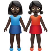 👭🏿 Emoji händchenhaltende Frauen: dunkle Hautfarbe Apple iOS 17.4.