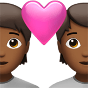 💑🏾 Emoji Pareja Enamorada, Tono De Piel Oscuro Medio en Apple iOS 17.4.