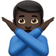 Emoji 🙅🏿‍♂️ Uomo Con Gesto Di Rifiuto: Carnagione Scura su Apple iOS 17.4.
