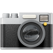 Emoji 📷 Fotocamera su Apple iOS 17.4.