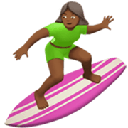 🏄🏾‍♀️ Emoji Mulher Surfista: Pele Morena Escura na Apple iOS 17.4.